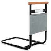 Bed assist rail with wooden handrail, built-in safety light, gray storage pouch, and black metal frame