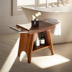 Wooden shower bench with a vase and bottles in a bathroom setting