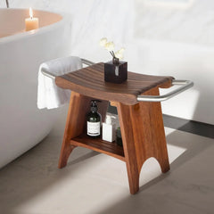 Wooden shower stool with a bathtub and candles in the background